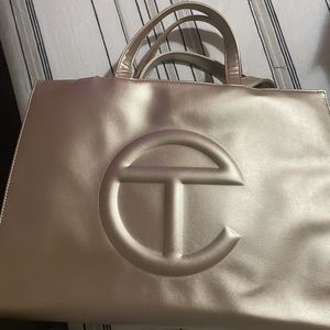 Telfar medium tote in the color gold
